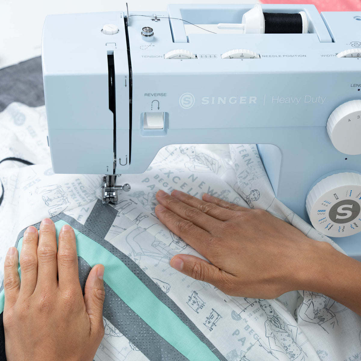 SINGER Heavy Duty 4423 Meltwater Blue Sewing Machine & Extension Table Bundle - official product image 2