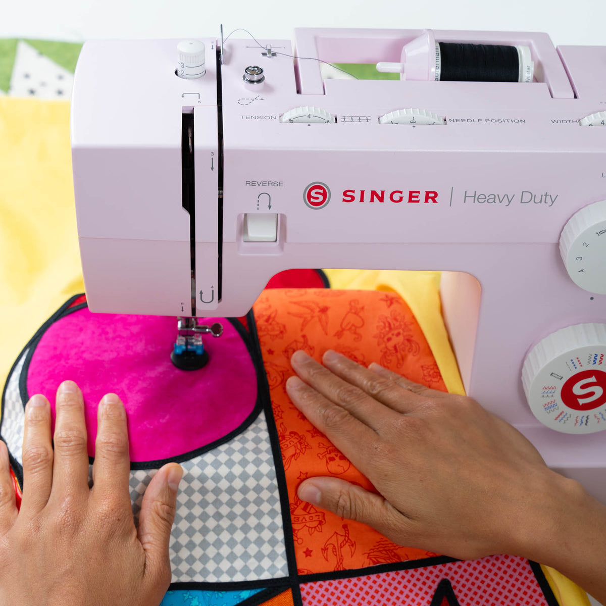 SINGER Heavy Duty 4452 Rosewater Pink Sewing Machine & Extension Table Bundle - official product image 2