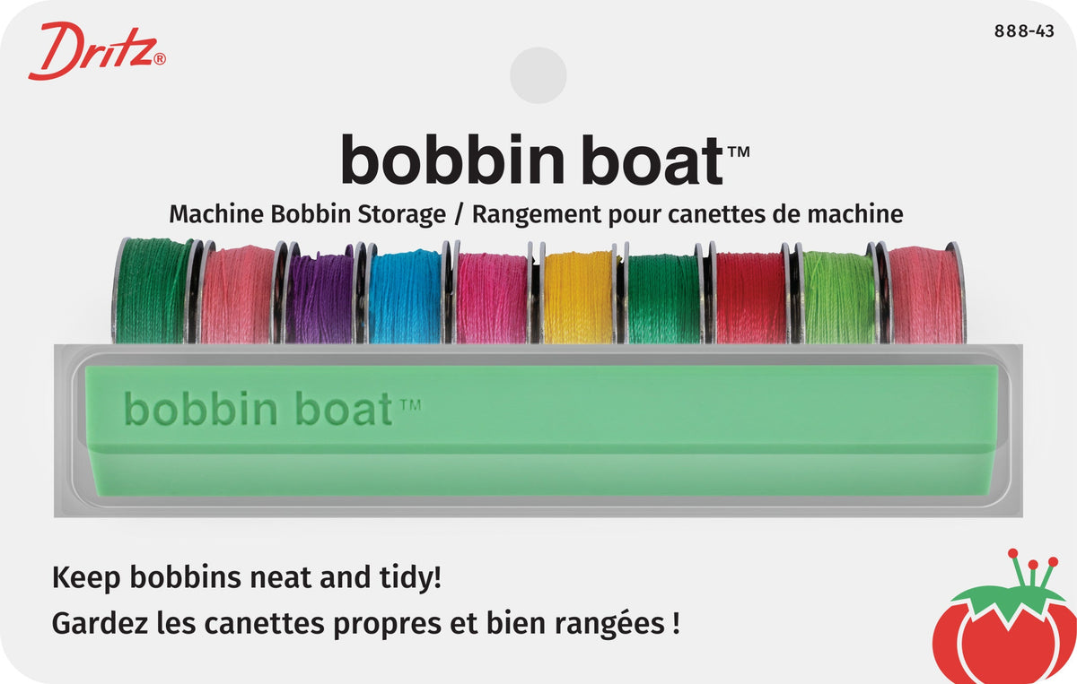 Dritz Bobbin Boat storage holder; color shown is representative, assorted color supplied